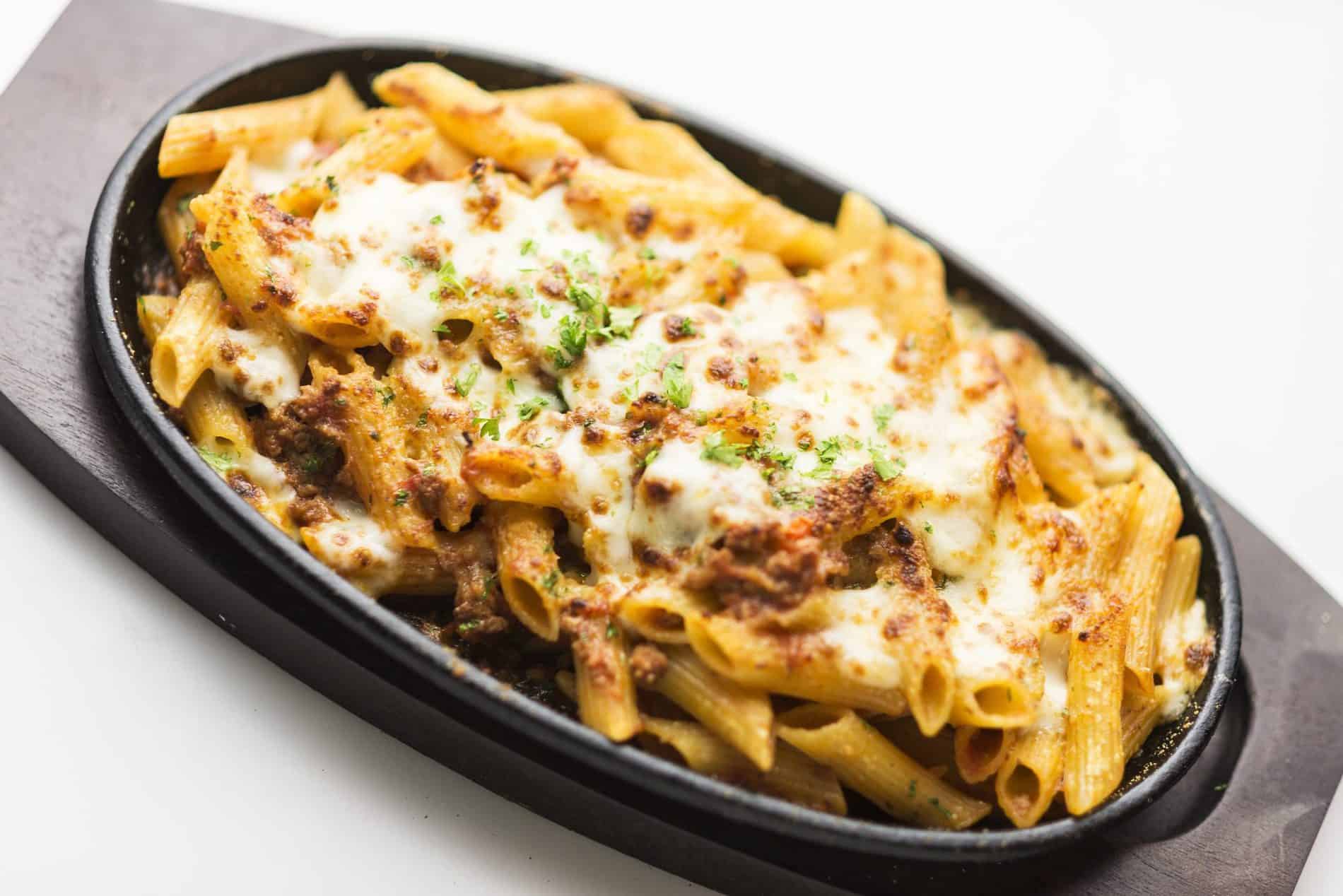 baked penne pasta with meat and cheese made with Jimmy's Taco Dip