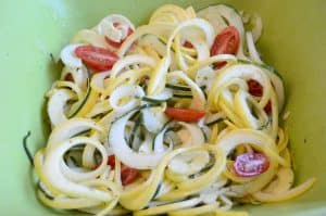 Sprialized summer squash, spiralized cucmber, cherry tomatoes and Jimmy's Sweet & Sour Dressing